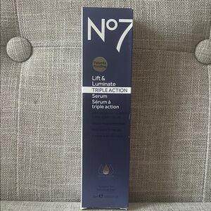 No7 Lift & Luminate Triple Action Serum — Navy Blue.